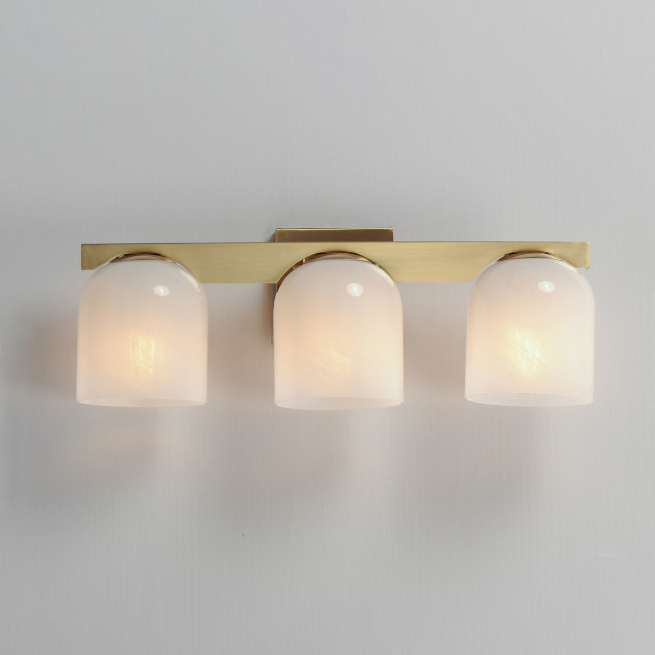 Maxim Scoop 3-Light Bath Vanity in Natural Aged Brass 21233MRNAB