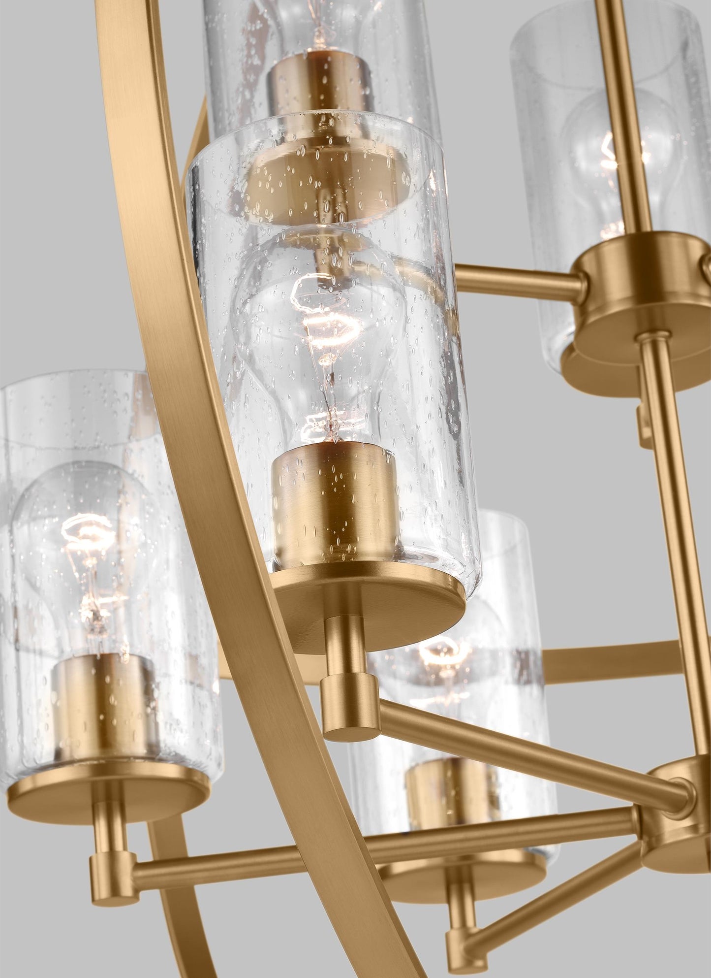 Generation Lighting Alturas indoor dimmable 9-light multi-tier chandelier in satin brass finish with spherical steel frame and cylindrical clear seeded glass shades 3124679-848