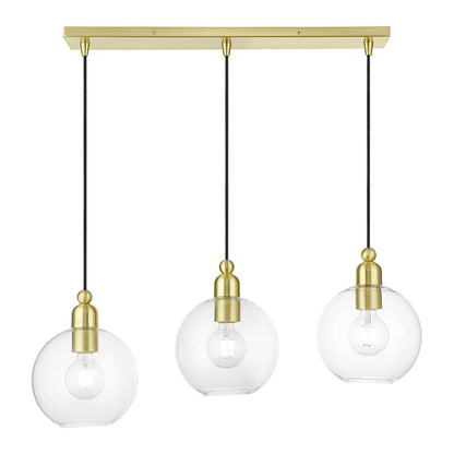 Livex Lighting Downtown Collection  3 Light Satin Brass Sphere Linear Chandelier in Satin Brass 48974-12